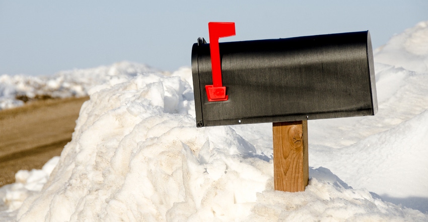 black mailbox in snow