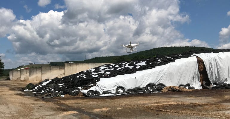 An Aurox drone performs a lower-accuracy flight over feed in a bunk silo