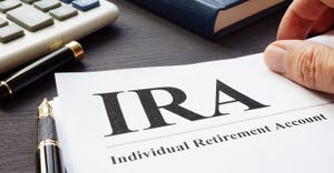 Documents about Individual retirement account IRA on a desk.