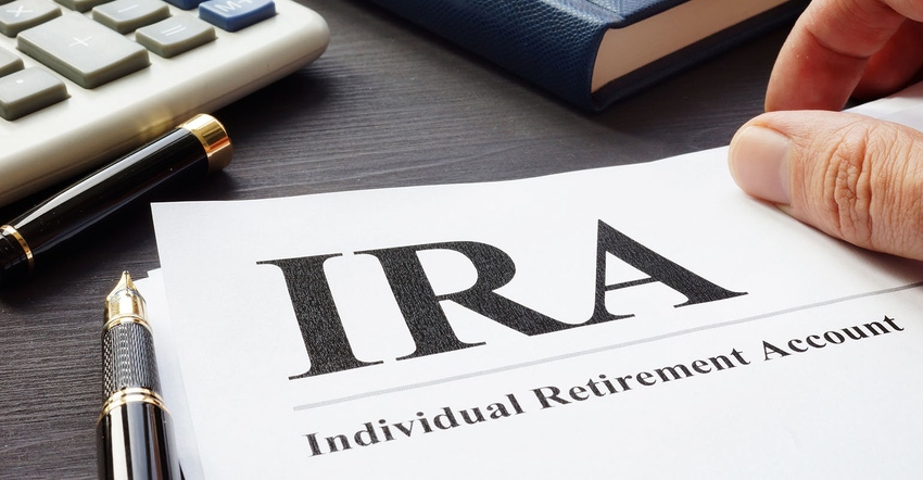Documents about Individual retirement account IRA on a desk. Documents about Individual retirement account IRA on a desk.