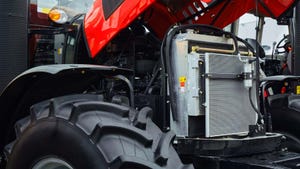 Tractor with open hood during repair