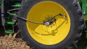 device on tractor tire that allows pressure to be adjusted on the go