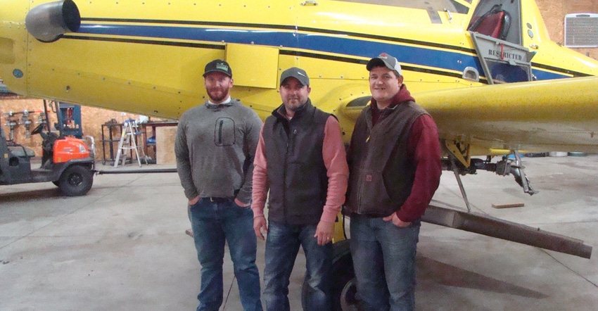 Chad Olds, Nick Yoder and Pat Fry in front of plane