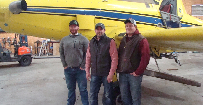 Chad Olds, Nick Yoder and Pat Fry in front of plane Chad Olds, Nick Yoder and Pat Fry in front of plane