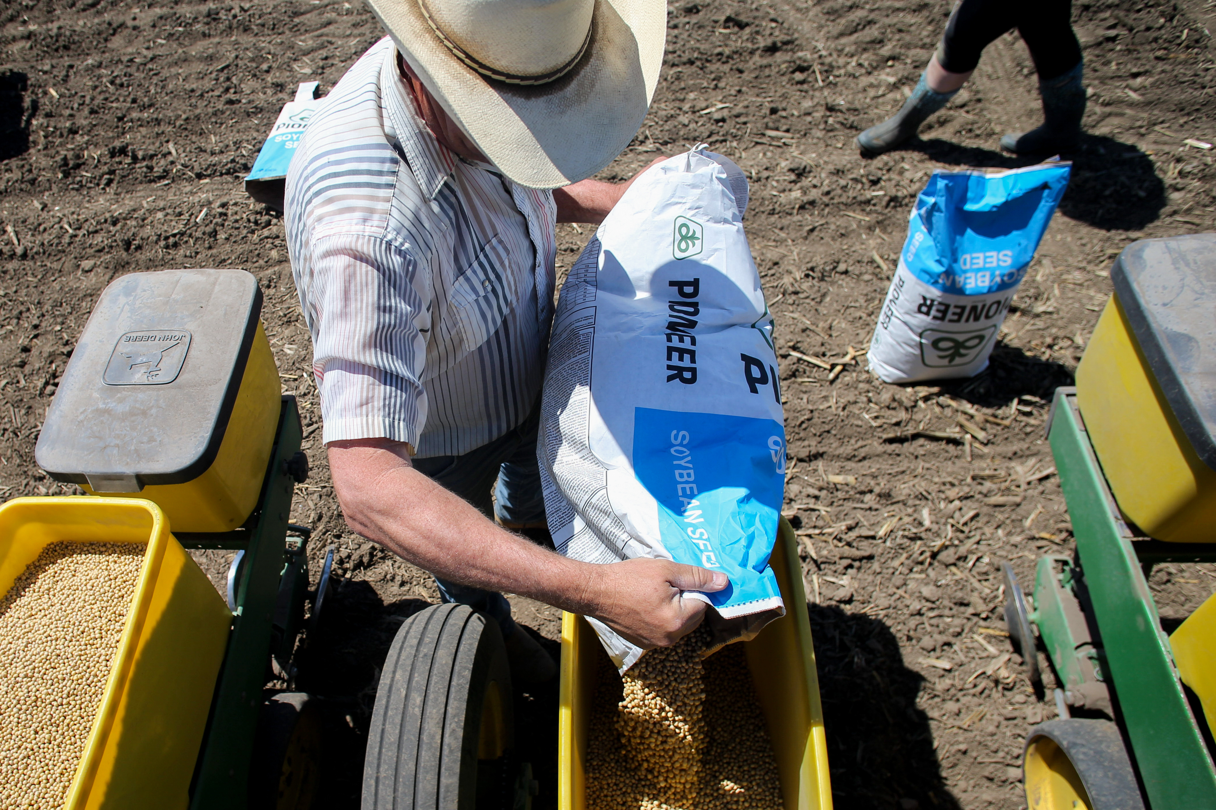 A farmer prepares soybeans for planting in Tiffin, Iowa.