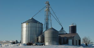 grain bins in winter on farm