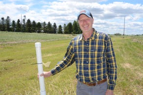 : Clark Porter, environmental specialist , stands next to one of the measurement locations where samples are taken 