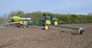 Planting with John Deere planter and tractor