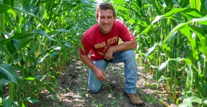 Mitchell Hora, founder and CEO of Continuum Ag, in cornfield