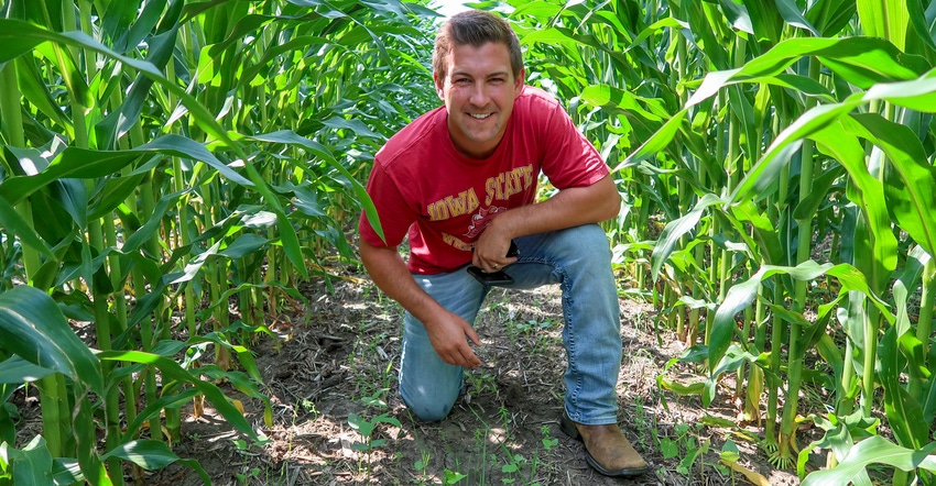 Mitchell Hora, founder and CEO of Continuum Ag, in cornfield Mitchell Hora, founder and CEO of Continuum Ag, in cornfield