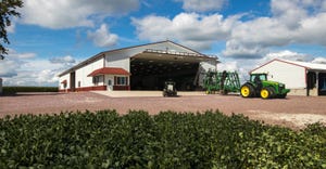 A new farm shop and tractor in front of it