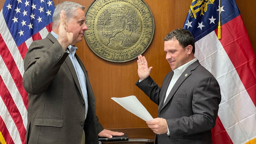 Georgia Commissioner of Agriculture Tyler Harper swears in Director Harlan Proveaux.