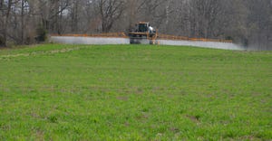sprayer in field of cover crops