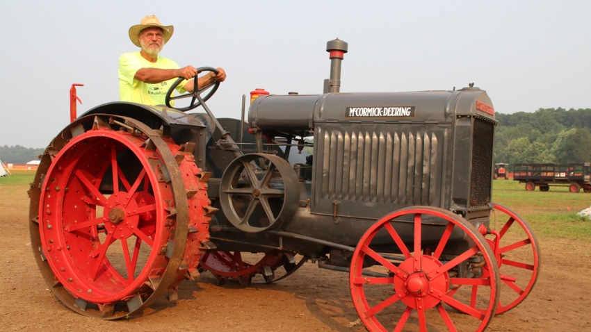 William Gorrell sits on his 10-20 McCormick tractor