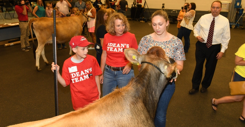Dean Cathann Kress works with her 4-H partner Wyatt Osborn Dean Cathann Kress works with her 4-H partner Wyatt Osborn