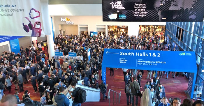 crowd of visitors line up at the door for the opening of CES 2020