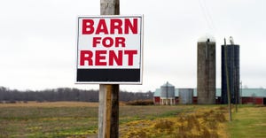 Barn for rent sign posted on farm property