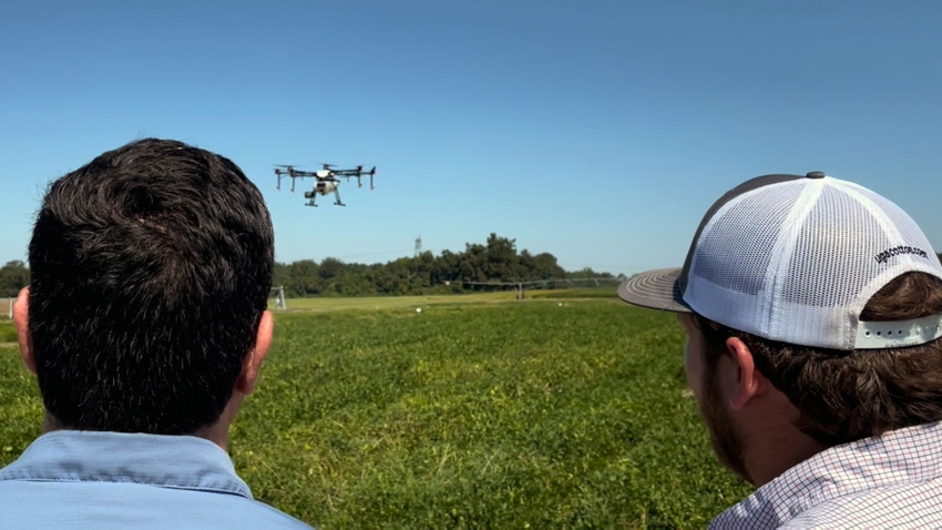 A DJI Agras MG-1 spray-capable drone flies over a Georgia peanut field.