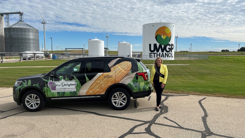 Taylor Schaefer stands next to her Alice in Dairyland SUV at United Wisconsin Grain Producers ethanol plant