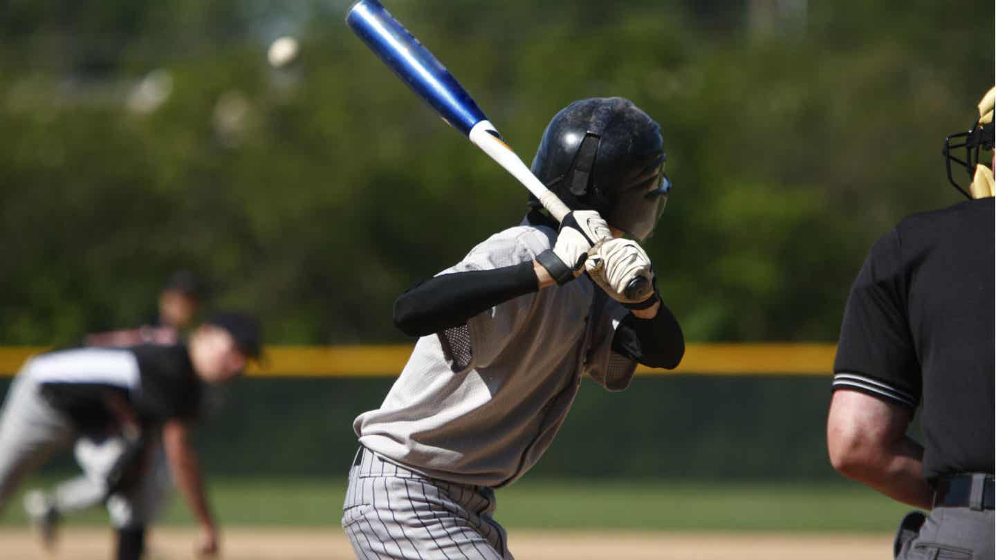 Japans Lieblingssportarten. Baseball Spieler beim Aufschlag