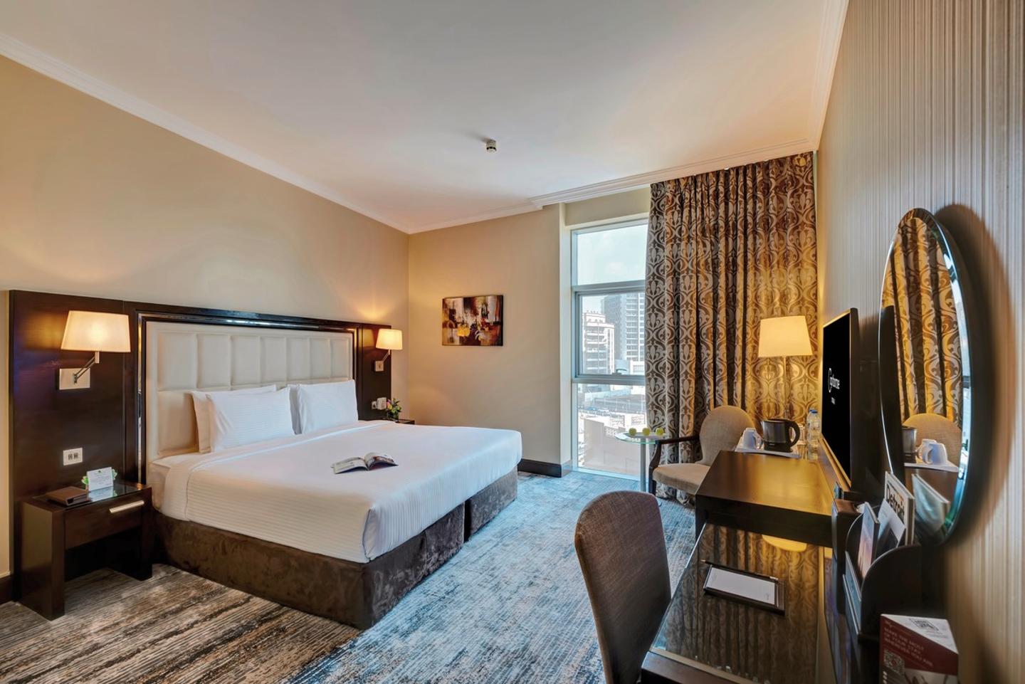 Wohnbeispiel Deluxe Suite One King Bed City View