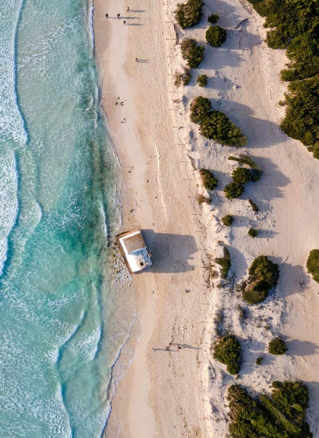 Pauschalreise auf Mallorca buchen Reiseziel im September: Torre de ses Animes auf Mallorca bei Sonnenuntergang.