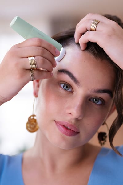 Lady with an hair remover