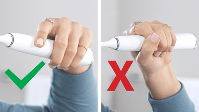 Right and wrong way to hold a toothbrush.