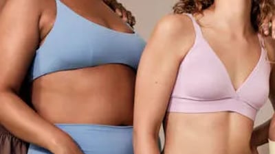 A close-up shot of two women wearing colourful underwear.