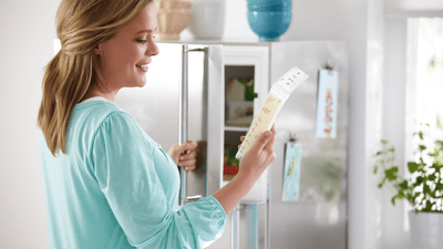 Image of mom with milk at fridge