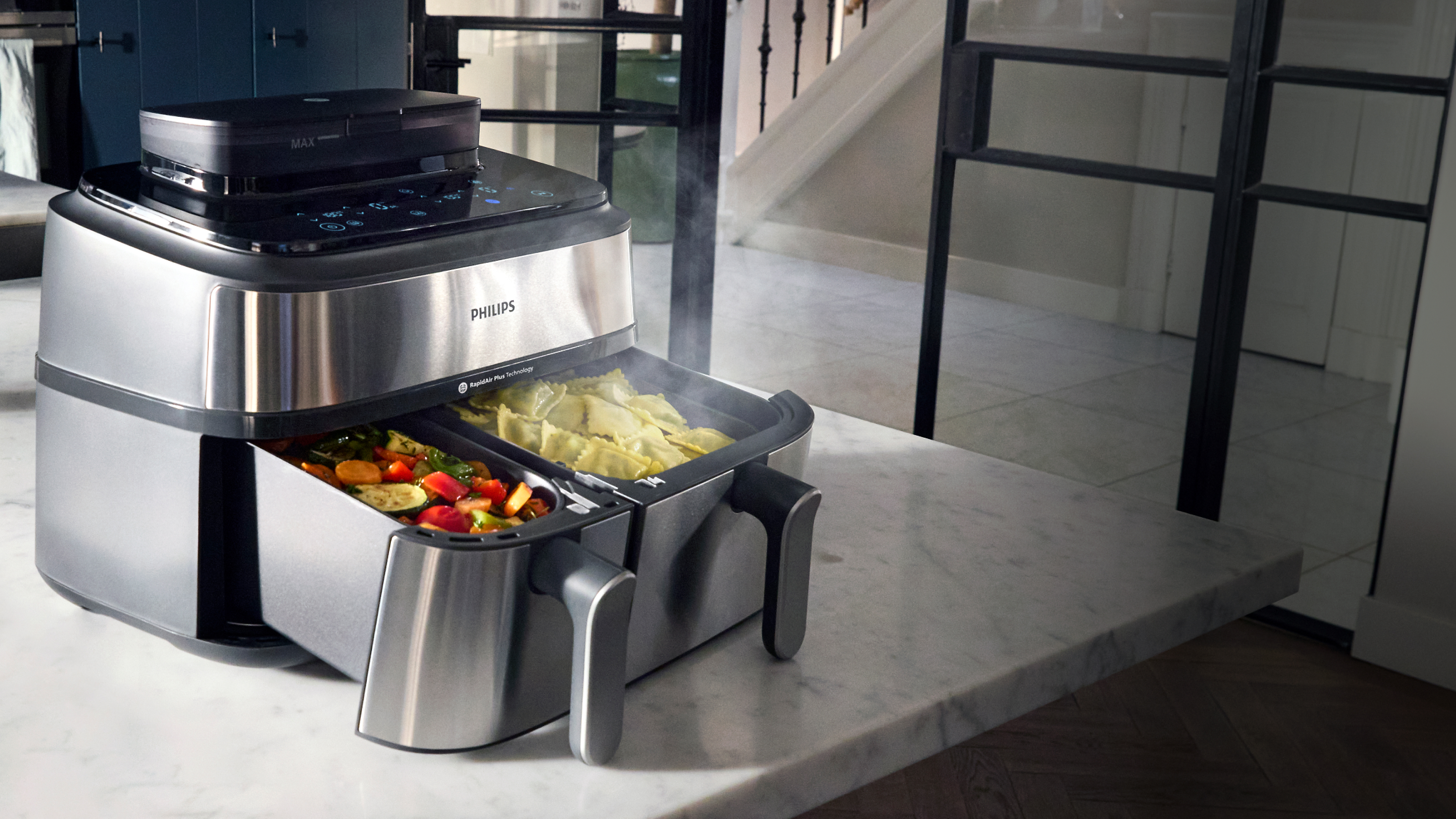 جهاز Airfryer من Philips ذو السلة المزدوجة مع وظيفة البخار.