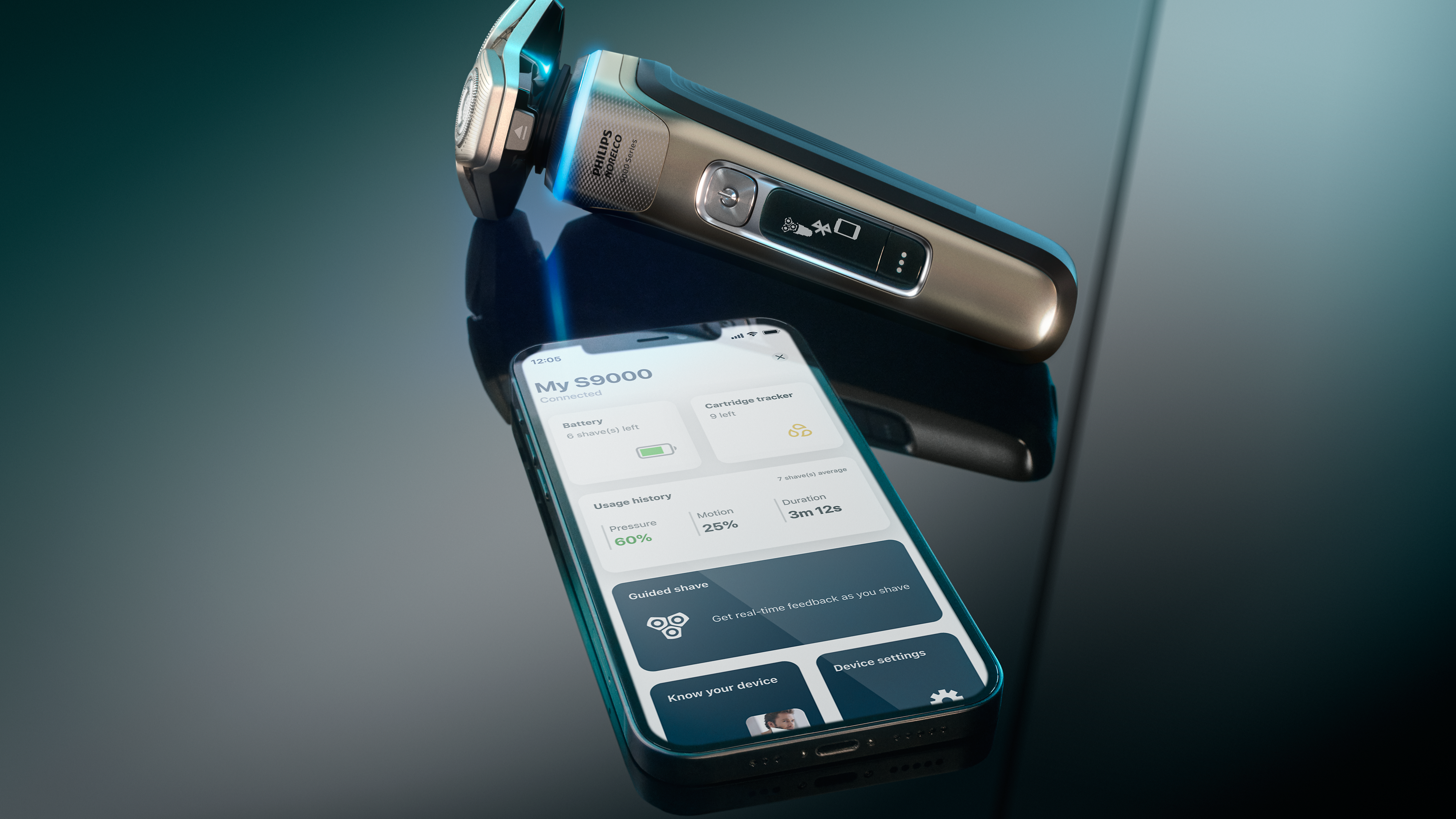 Una afeitadora eléctrica y un teléfono sobre una mesa.