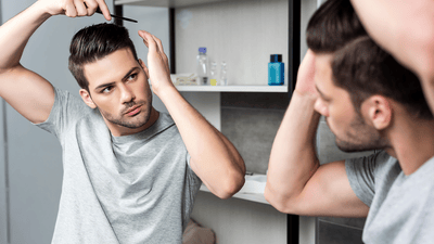 Close-up of confident man’s hairstyle