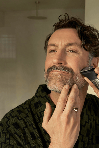 Man shaving his beard