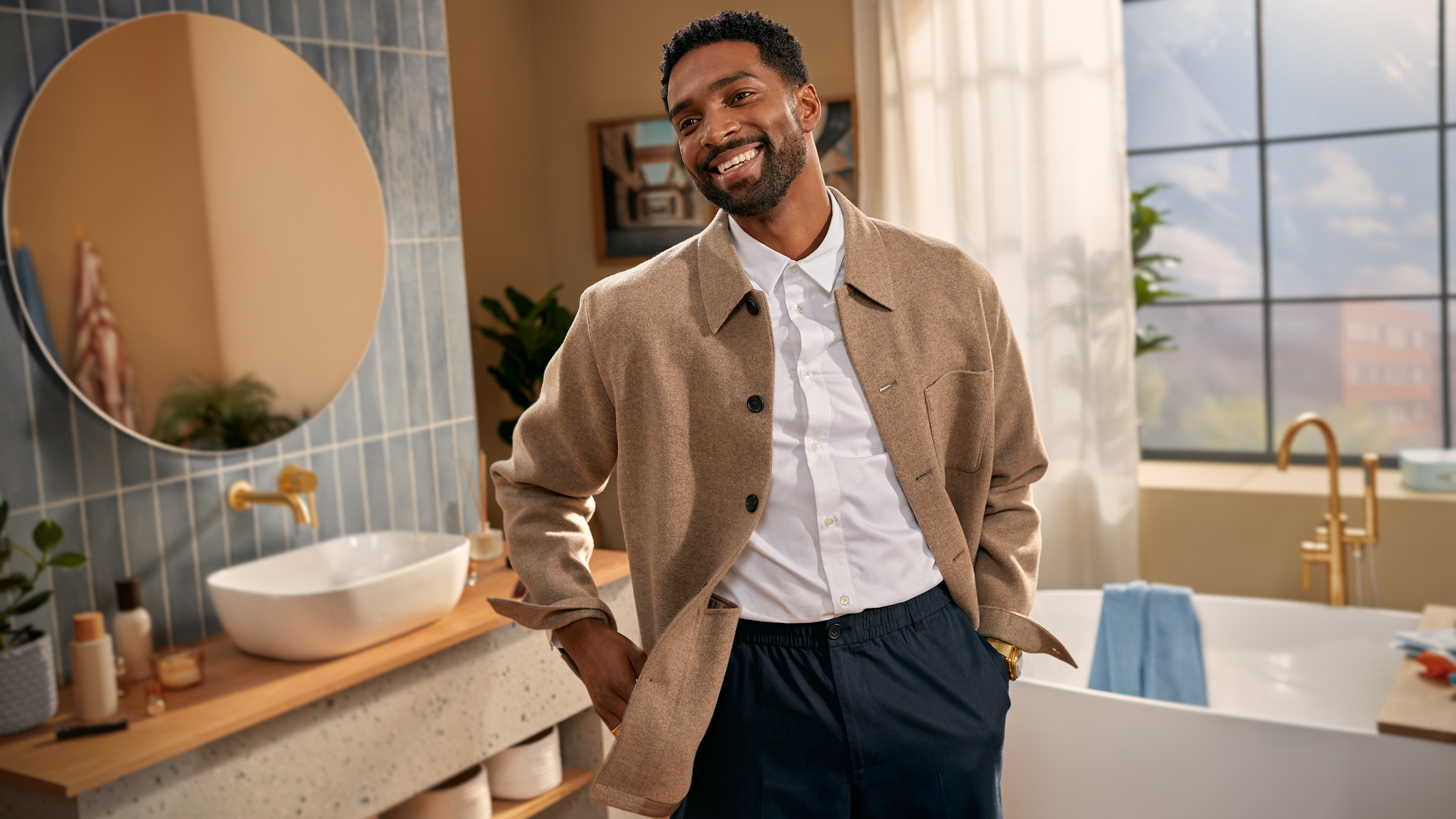Man smiling in mirror with freshly trimmed beard