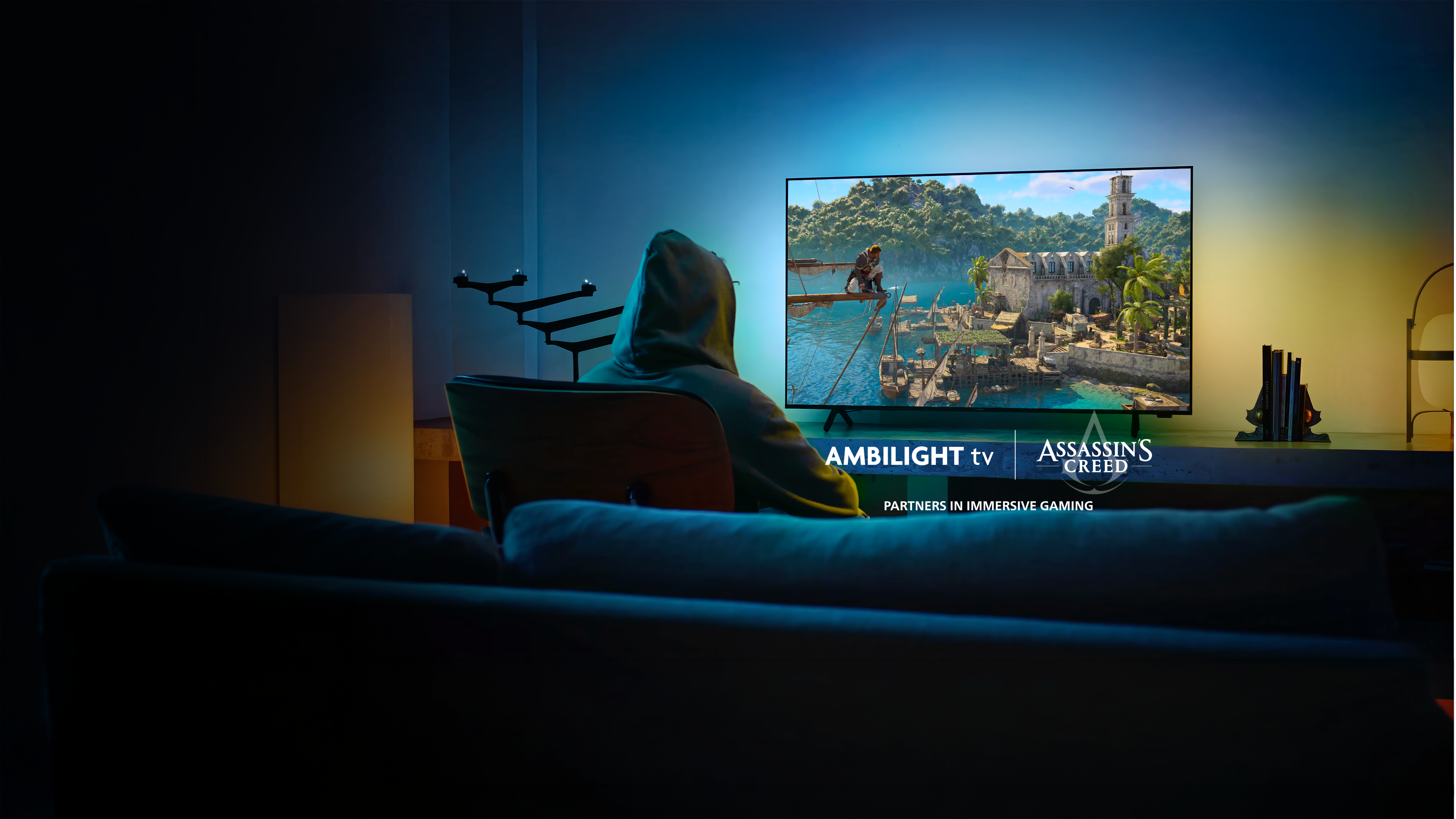 Philips Ambilight TV'nin bulunduğu bir oturma odası