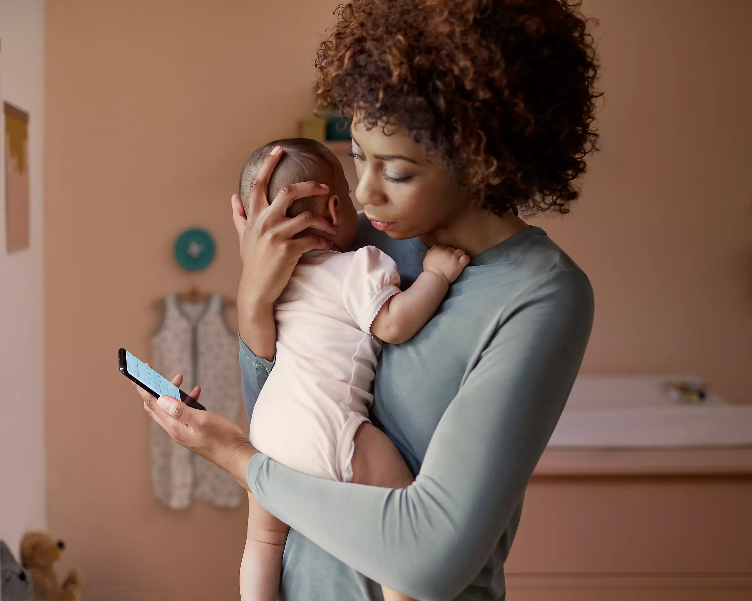 Person using the Pregnancy⁺ app on phone