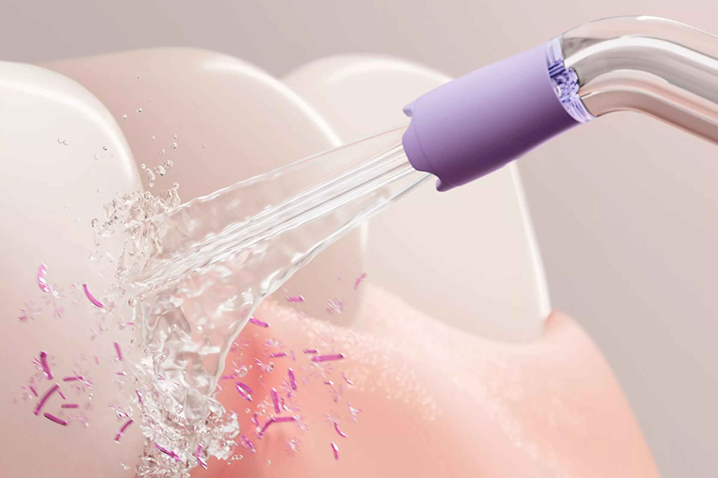 A Quad Stream tip cleaning between teeth.