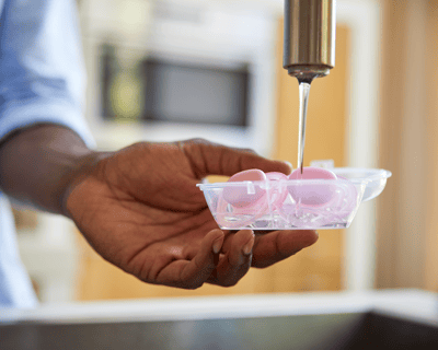 Sterilizing the pacifiers in the handy case