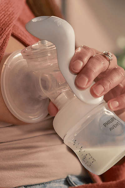 Woman wearing the breast pump