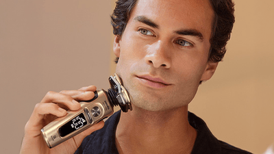 Dry shaving with Philips i9000 Prestige electric shaver