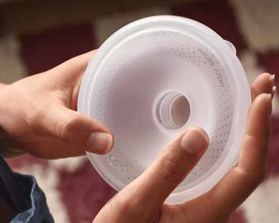 Mom holding silicon breast shield
