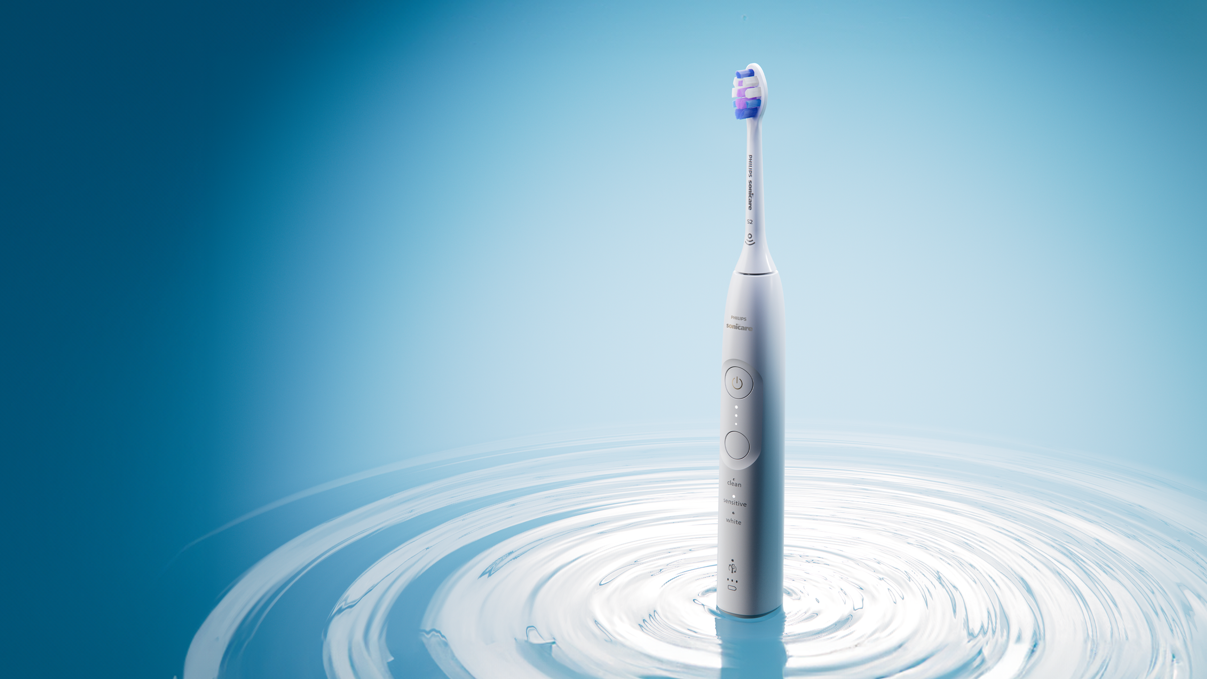 Een handvat uit de Philips Sonicare 5000–7000-serie, omgeven door golven