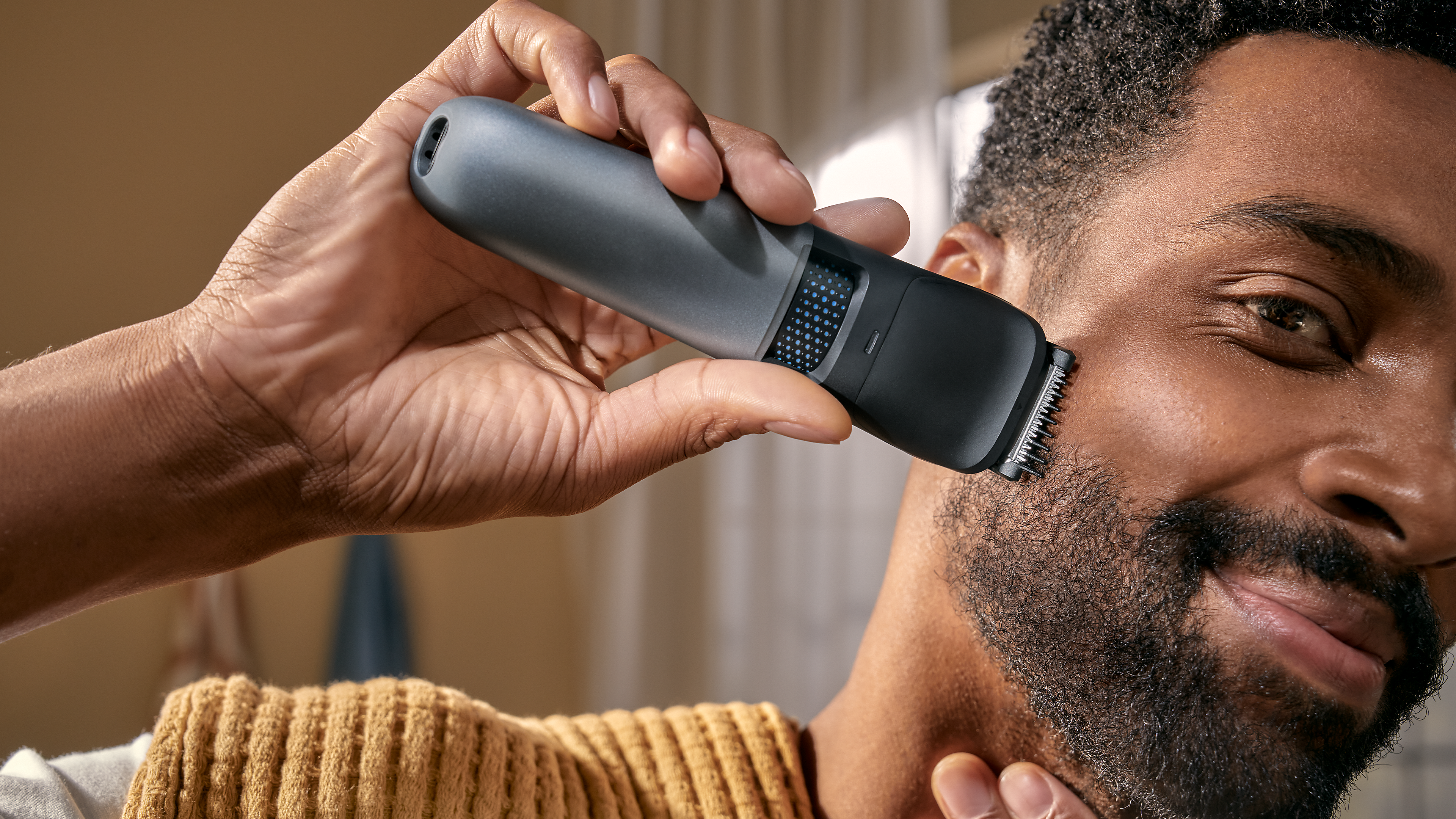 Man shaving his beard