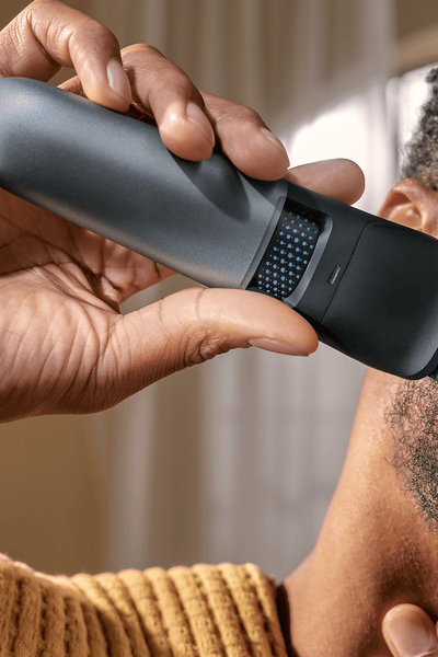 Man shaving his beard