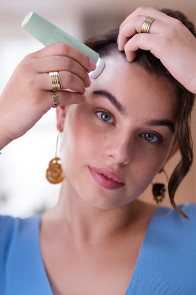 Lady with an hair remover