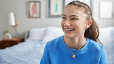 Как чистить зубы с брекетами?