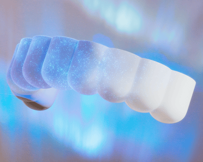 A dental professional holding a Philips Zoom! Proven efficacy