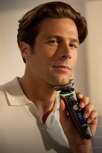 Man holding a shaver