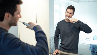 Image of brush head cleaning teeth